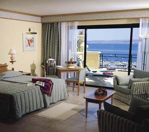 Superior double or twin with sea view, terrace, an extra bed, private facilities (bath and shower), and breakfast